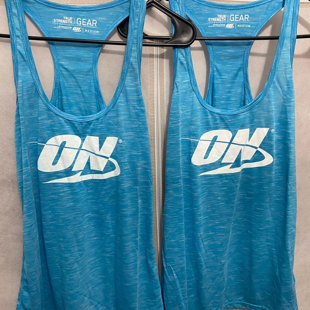 Women’s blue cross back tank top Lot Of 2